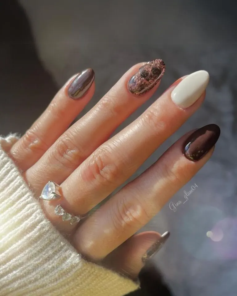 Brown-and-white-nails-with-glitter-accents