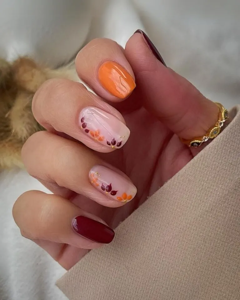 Burgundy-and-burnt-orange-floral-nails