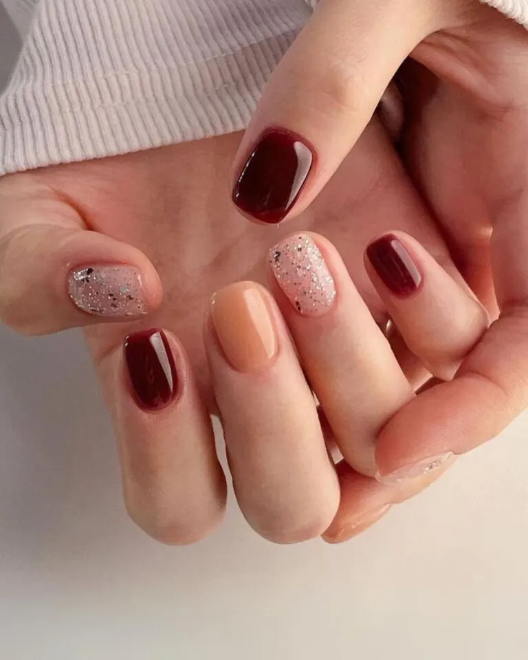 Burgundy-mani-with-glittery-accents