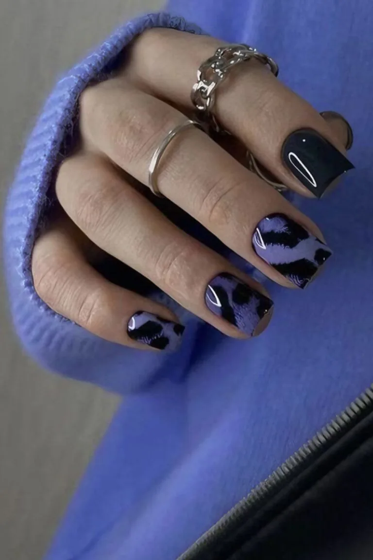 Purple leopard print nail design