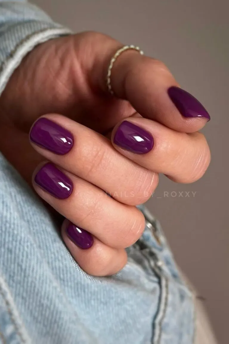 Solid plum-colored fall nails